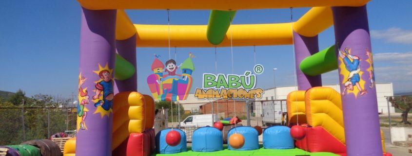 Castillo hinchable Grand Prix Barriles locos. Alquiler de Castillos hinchables